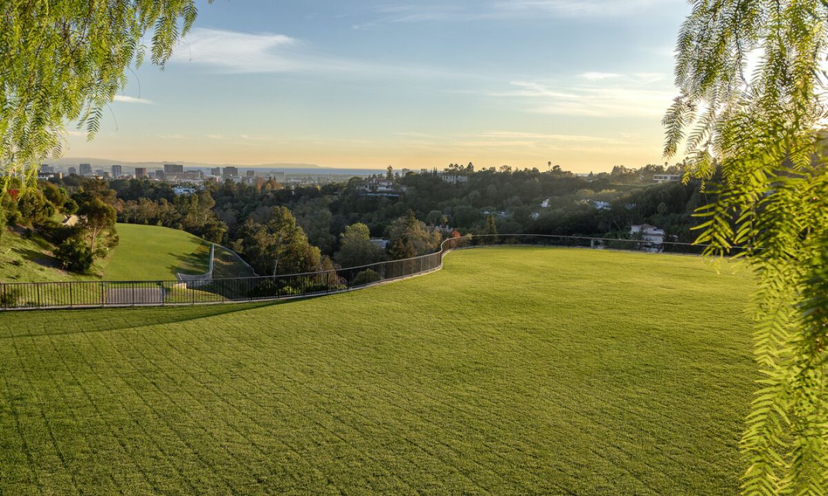 This three-acre lot once owned by late film producer Steve Bing is on the market in Bel-Air for $33 million.