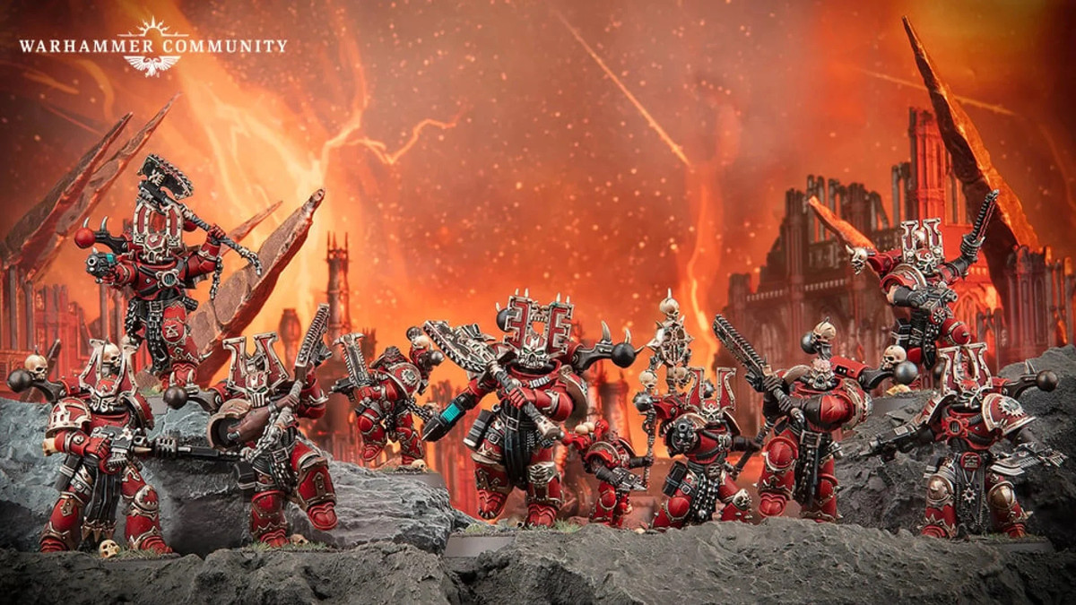 Warhammer 40,000: Models of the World Eaters Space Marines, heavily armored figures who wear red armor adorned with skulls.