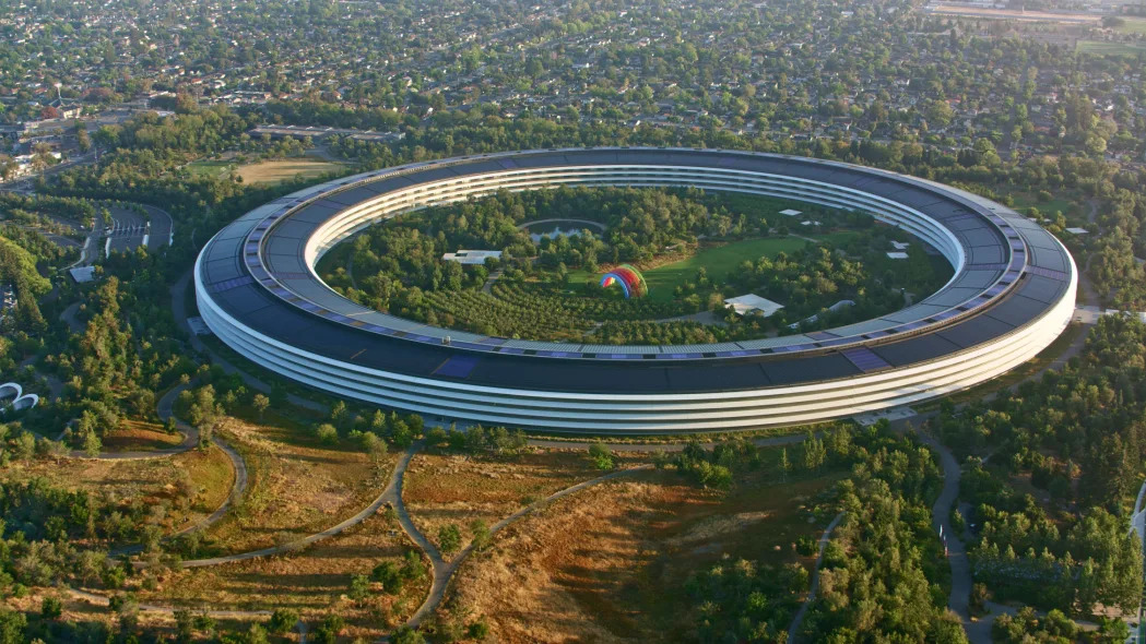 Cupertino, California / USA - December 22, 2022: Aerial view of Apple corporate headquarters building in Silicon Valley. Apple Inc. is an American multinational technology company headquartered in Cupertino, California that designs, develops, and sells consumer electronics, computer software, and online services. (Image Credits: simonkr/Getty Images)